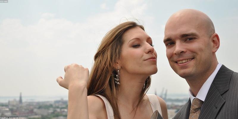 Person daydreaming about crush with thought bubbles showing psychology of romantic attraction